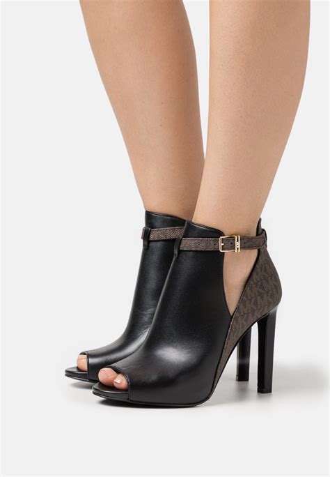 michael kors womens heeled boots|Michael Kors heels size 10.